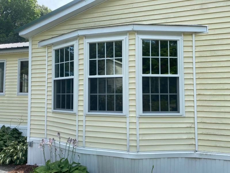 How Vinyl Windows Replacement Improves Energy Efficiency